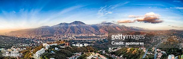 panoramic image of caracas city aerial view with el avila - caracas stock pictures, royalty-free photos & images