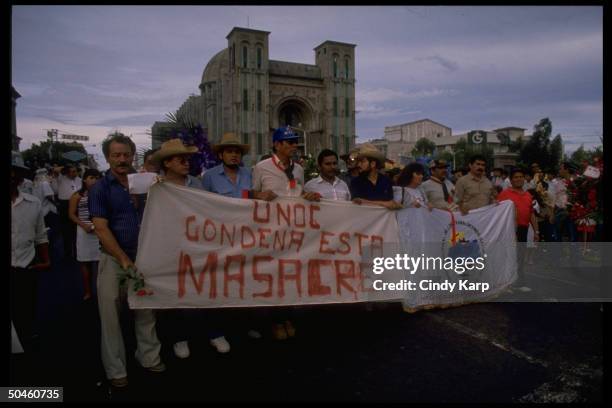 Funeral procession for labor unionists killed in bombing of labor federation HQ, which leftist guerrillas accuse govt. Of doing.