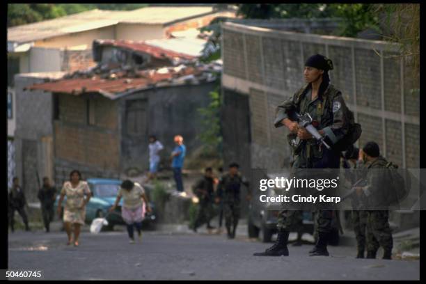 Govt. Troops moving into neighborhood held by leftist FMLN guerrillas in first days of major rebel offensive.