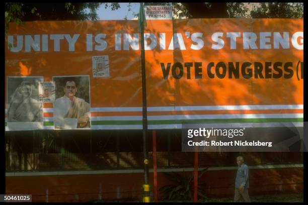 Congress Party parliamentary election campaign billboard adorned w. Portraits of PM Rajiv Gandhi & his mother, former PM Indira.