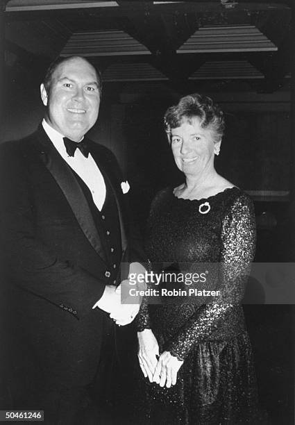 Good of TV weatherman Willard Scott and wife Mary in evening clothes.