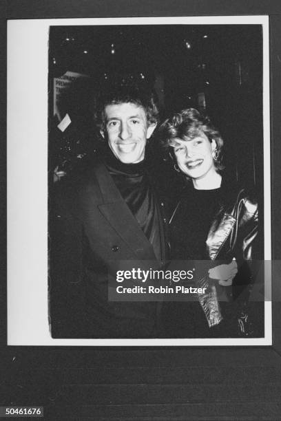 Record producer Richard Perry with an unidentified woman at the party celebrating the 25 years of Elaine's restaurant.