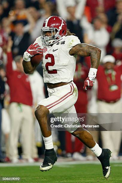 Derrick Henry of the Alabama Crimson Tide runs for a 50 yard touchdown in the first quarter against the Clemson Tigers during the 2016 College...