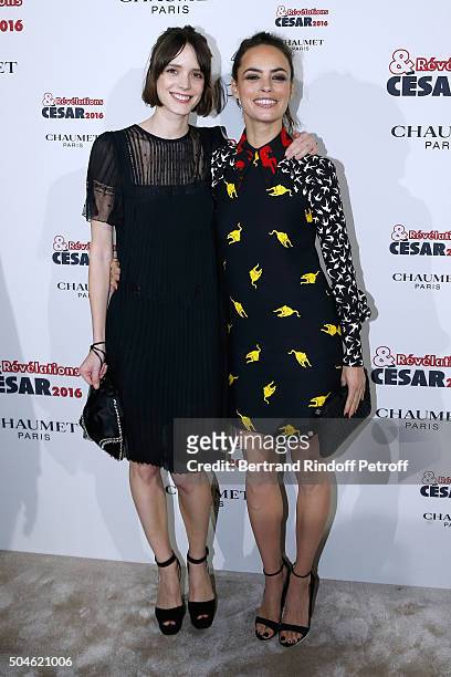 Actress Stacy Martin, dressed in Prada, nominated for "Taj Mahal", and her sponsor Berenice Bejo, dressed in Miu Miu, attend the 'Cesar - Revelations...