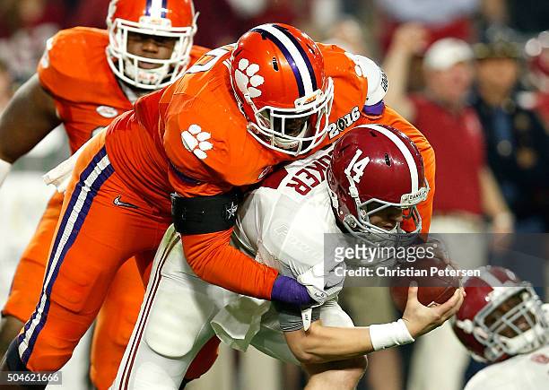 Shaq Lawson of the Clemson Tigers sacks Jake Coker of the Alabama Crimson Tide in the second quarter during the 2016 College Football Playoff...