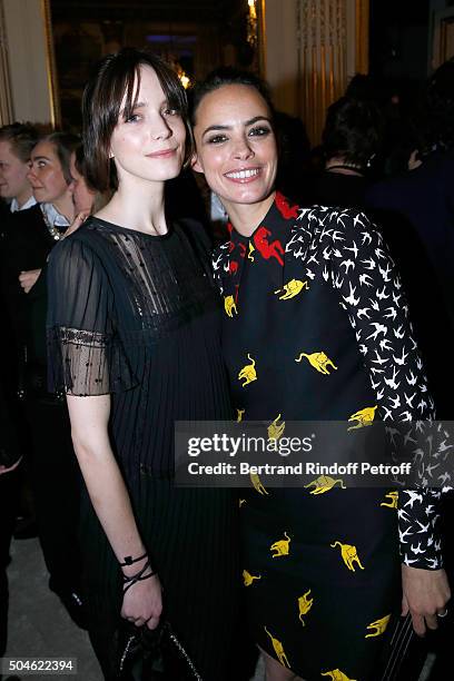 Actress Stacy Martin, dressed in Prada, nominated for "Taj Mahal", and her sponsor Berenice Bejo, dressed in Miu Miu, attend the 'Cesar - Revelations...