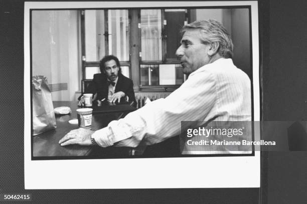 Defense attorney for Joel Steinberg Ira London conferring w. Co-counsel, Adrian DiLucio, in lounge on 16th floor of Manhattan Criminal Courts...