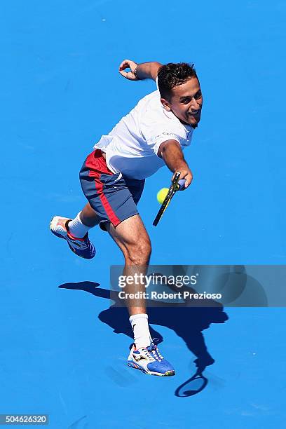 Nicolas Almagro of Spain plays a backhand in his match against Paul-Henri Mathieu of France during day one of the 2016 Kooyong Classic at Kooyong on...