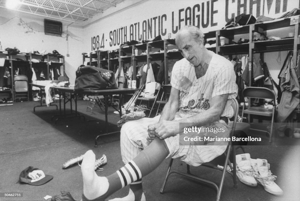 Max Patkin Clown prince of basesball Max Patkin sitting in chair in locker room ...