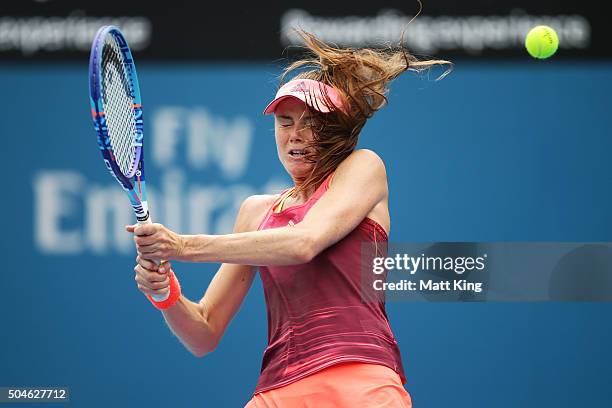 Daniela Hantuchova of Slovakia is hit in the face by the ball while playing a backhand in her match against Samantha Stosur of Australia during day...