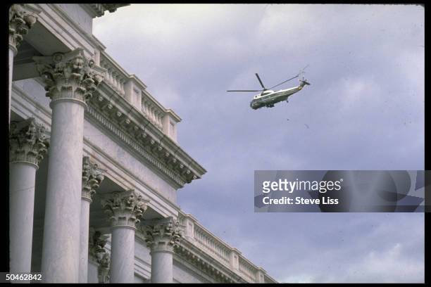 Marine One helicopter vanishing into distance, carrying Pres. & Nancy Reagan upon their final departure fr. WH after 8 yrs. In office.