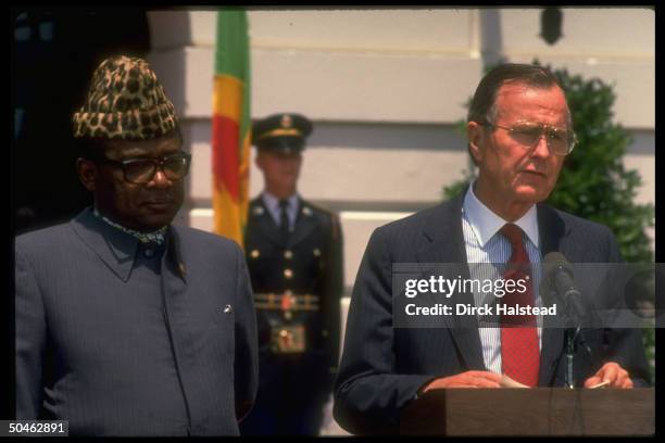 Pres. Bush w. Pres. Mobutu of Zaire, making departure statements after lunch, outside, at WH.