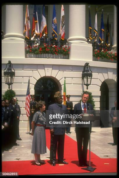 Pres. Bush w. Pres. Mobutu of Zaire, making departure statements after lunch, outside, at WH.