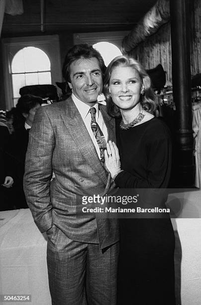 Actress Mariette Hartley posing w. Actor Armand Assante at the American Suicide Foundation benefit dinner.
