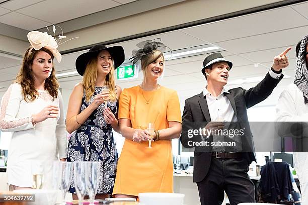 fun at the office party - horse racing australia stock pictures, royalty-free photos & images