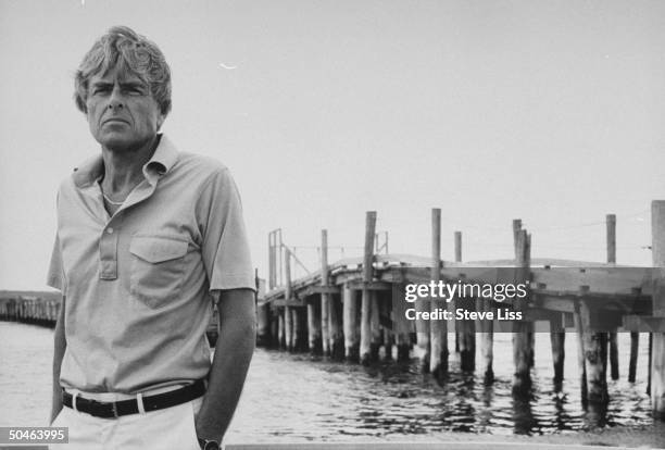 Leslie Leland standing in front of the Dike Bridge; Mary Jo Kopechne drowned in the car that Sen. Ted Kennedy drove over the side of this bridge in...