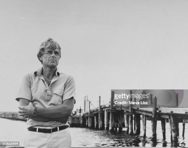 Leslie Leland standing in front of the Dike Bridge; Mary Jo Kopechne drowned in the car that Sen. Ted Kennedy drove over the side of this bridge in...