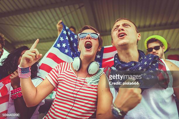 group of usa supporters - female football fans stock pictures, royalty-free photos & images