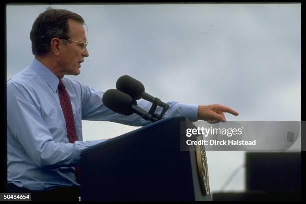 Pres. Bush addressing GOP campaign fundraiser for Gov. Bob Martinez, sporting shirt-sleeves in sunny warmth of St. Petersburg, FL.