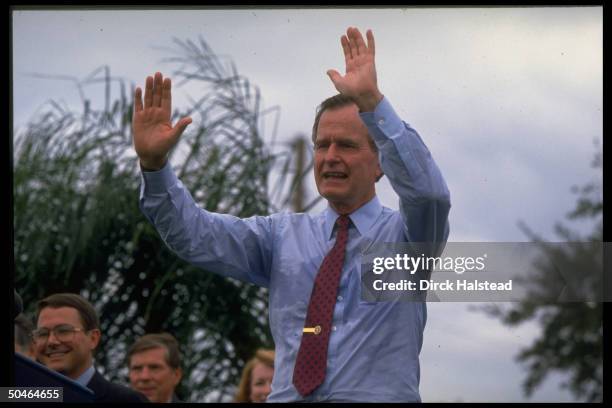 Pres. Bush addressing GOP campaign fundraiser for Gov. Bob Martinez, sporting shirt-sleeves in sunny warmth of St. Petersburg, FL.