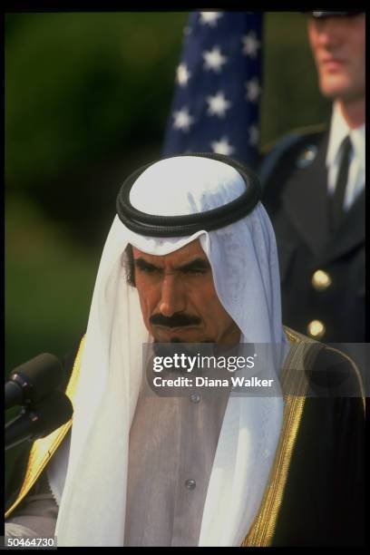 Kuwaiti Emir Jaber al-Ahmad Al Sabah speaking during WH S. Lawn departure ceremony, ending gulf crisis visit.