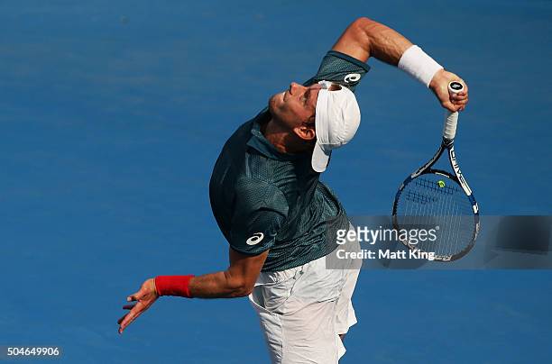 James Duckworth of Australia serves in his match against Inigo Cervantes of Spain during day three of the 2016 Sydney International at Sydney Olympic...