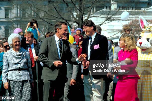 Pres. & Barbara Bush w. WH Easter invitees incl. Daughter-in-law Sharon w. Baby Ashley & actor Christopher Reeve .