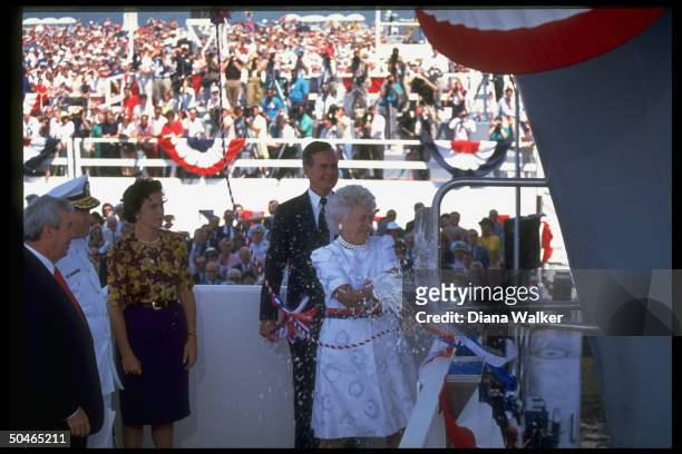 Pres. Bush , daughter Doro LeBlond et al watching Barbara christening USS George Washington, cringing fr. Showering of champagne.