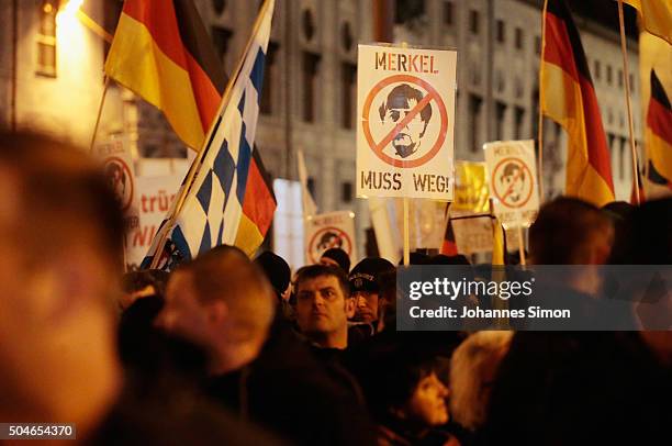 Supporters of the right-wing populist group Pegida march on January 11, 2016 in Munich, Germany. Pegida and other right-wing activists have been...