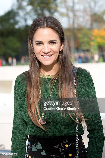 Fashion buyer for The Webster Laure Heriard-Dubreuil wears a Louis Vuitton bag and shoes, Valentino skirt and top on day 9 during Paris Fashion Week...