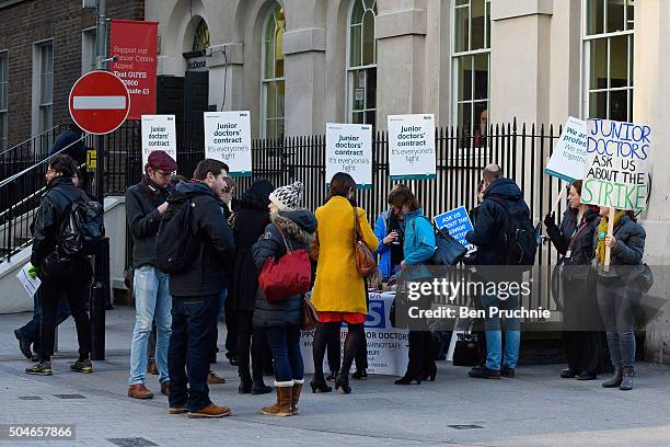 Junior doctors form a picket line outside Guy's hospital as junior doctors stage a 24-hour strike across the NHS on January 12, 2016 in Birmingham,...