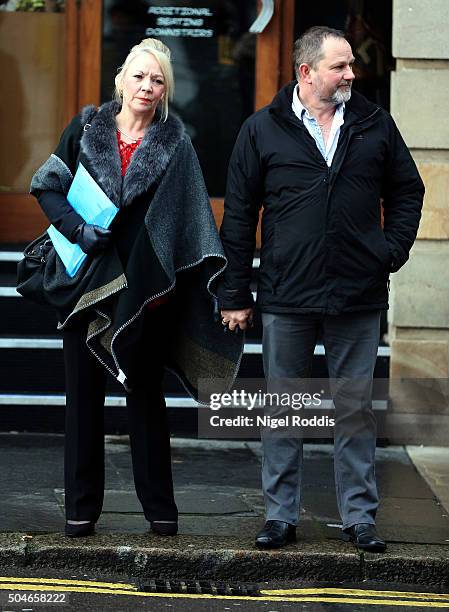 Debbie Essery, sister of PC David Rathband, and her husbamd Paul Essery arrive ahead of the family's court case against Northumbria police at...