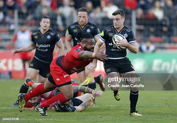 George Ford of Bath Rugby and Mathieu Bastareaud of Toulon in action during the European Champions Cup match between Racing Club de Toulon and Bath...