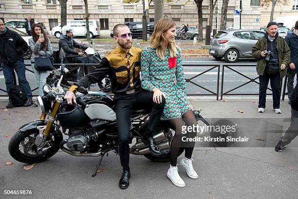 Fashion Buying director for MyTheresa.com Justin O'Shea with Style Editor for Harpers Bazaar Germany Veronika Heilbrunner who wears a Miu Miu dress...