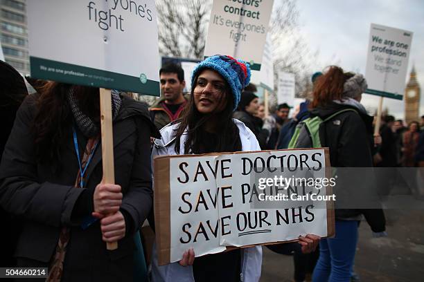 Members of staff take part in a picket outside St Thomas' Hospital on January 12, 2016 in London, United Kingdom. Junior doctors in England have gone...