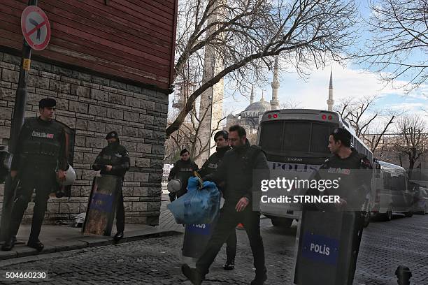 Turkish police secure the area after an explosion in the central Istanbul Sultanahmet district on January 12, 2016 in Istanbul, Turkey. At least 10...