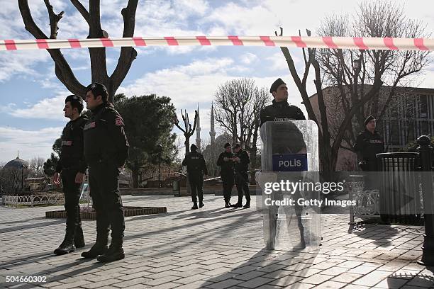 Turkish police secure the area after an explosion in the central Istanbul Sultanahmet district on January 12, 2016 in Istanbul, Turkey. At least 10...