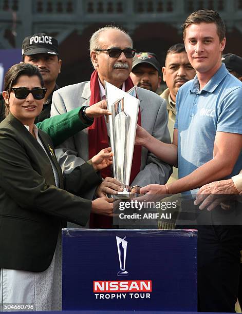 Pakistan Super League chairman Najam Sethi holds the ICC 2016 World Twenty20 trophy during a ceremony in Lahore on January 12, 2016. The...