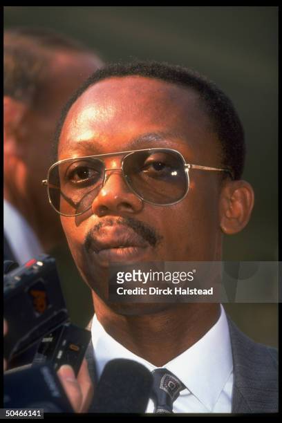 Coup-ousted Haitian Pres. Jean Bertrand Aristide speaking to press outside WH after mtg. W. Pres. Bush, seeking his support in returning to power.