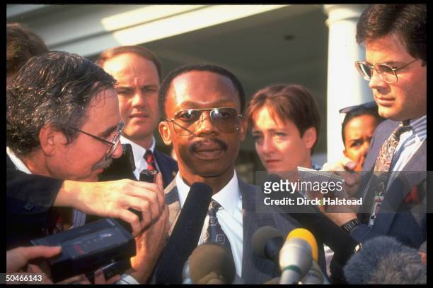 Coup-ousted Haitian Pres. Jean Bertrand Aristide w. Press outside WH after mtg. W. Pres. Bush, seeking his support in returning to power.