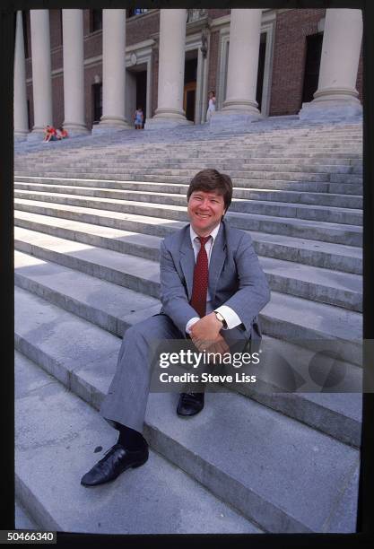 Harvard economist Jeffrey Sachs posing sitting on campus bldg.'s steps.
