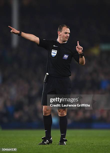 Referee Robert Madley looks on during the Capital One Cup Semi Final First Leg match between Everton and Manchester City at Goodison Park on January...