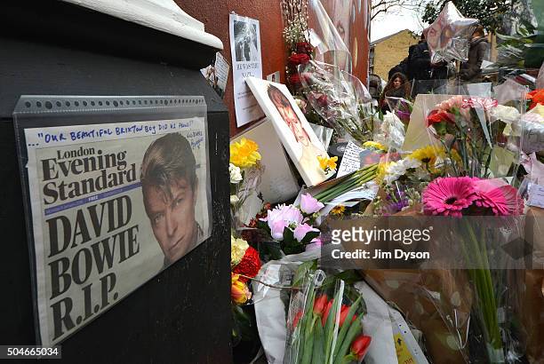 Tributes are paid to the late David Bowie at a mural in South London, on January 12, 2016 in London, England. British music and fashion icon David...