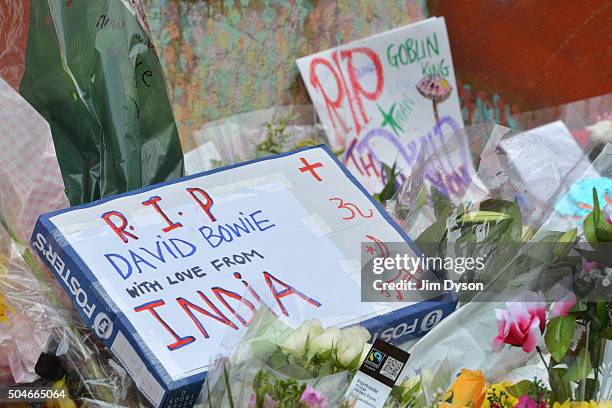 Tributes are paid to the late David Bowie at a mural in South London, on January 12, 2016 in London, England. British music and fashion icon David...