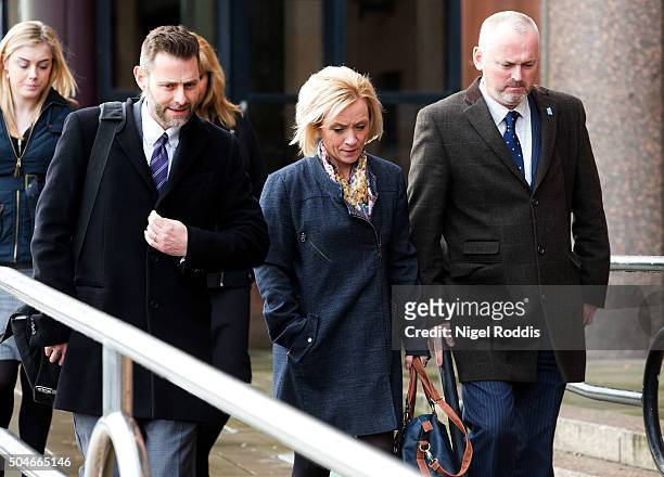 Kath Rathband leaves after appearing at PC David Rathband family's court case against Northumbria police at Newcastle Crown Court on January 12, 2016...