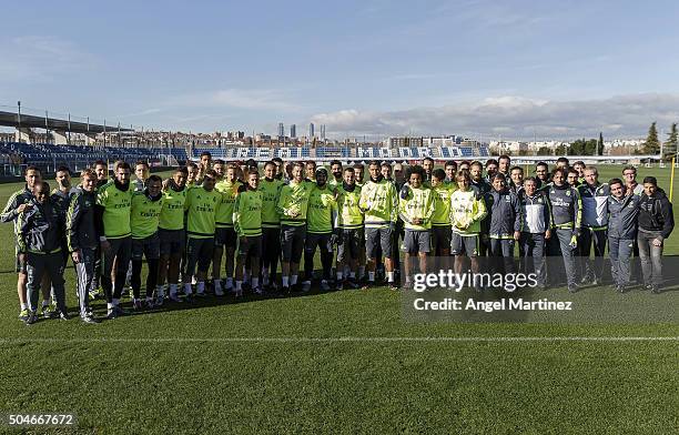 Real Madrid team pose alongside Sergio Ramos, Marcelo Vieira, Luka Modrid and Cristiano Ronaldo with their FIFA FIFPro World XI for 2015 trophies...