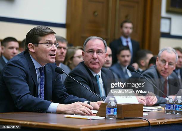 Michael Morell, former acting director of the CIA testifies while Michael Vickers, former Defense undersecretary for intelligence, and Robert Ford,...