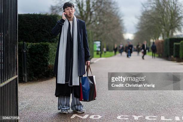 Guest after the Burberry Prorsum show during London Collections Men AW16 on January 11, 2016 in London, England.