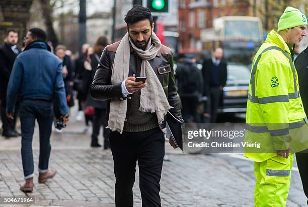 Guest after the Burberry Prorsum show during London Collections Men AW16 on January 11, 2016 in London, England.