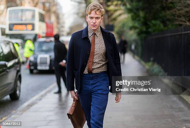 Guest before the Burberry Prorsum show during London Collections Men AW16 on January 11, 2016 in London, England.